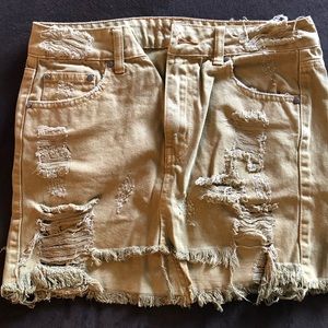 Distressed denim skirt